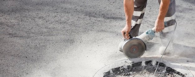 worker detail plane with radial and uniform, asphalt in the background