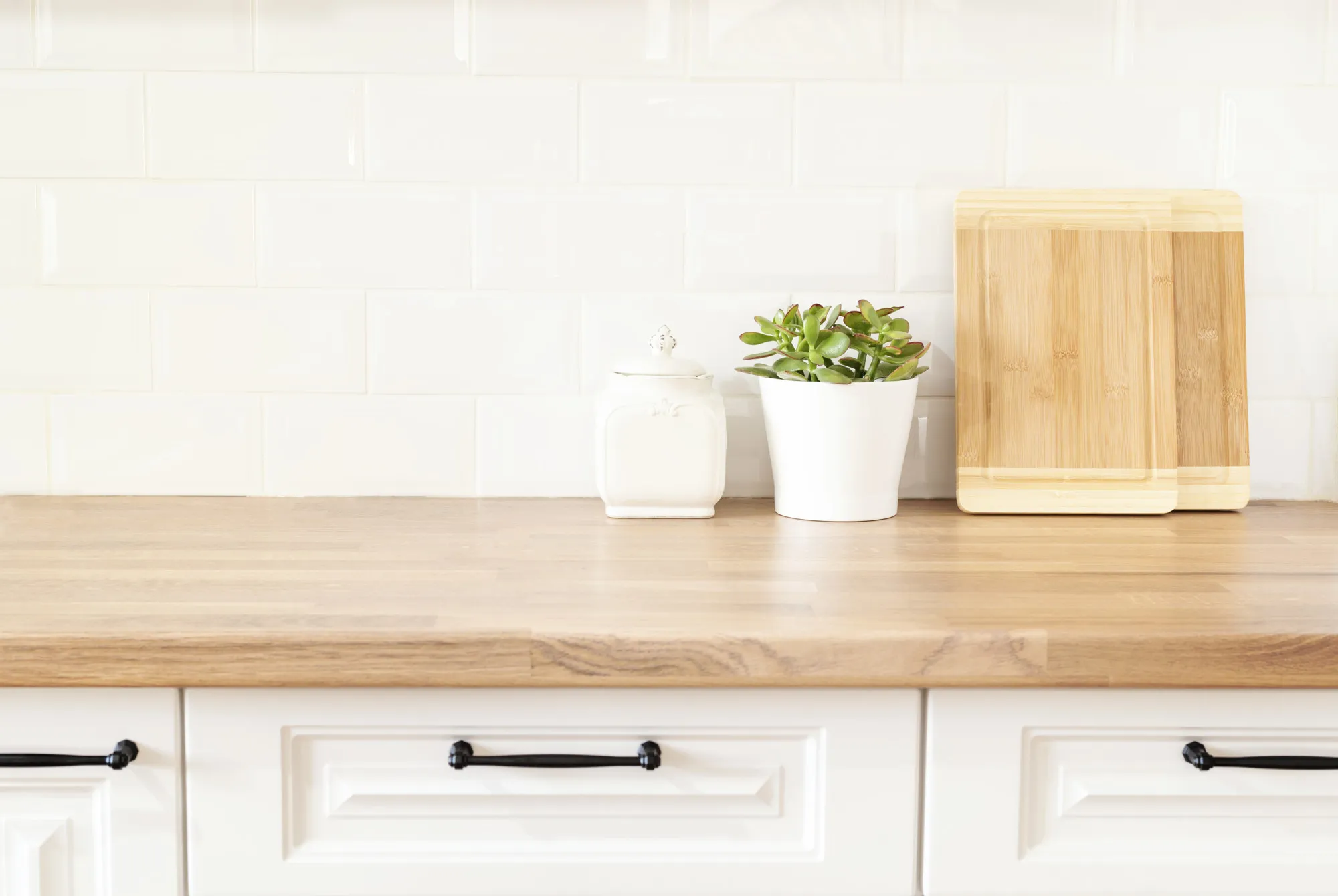 Bright And Clean Kitchen With White Cabinets