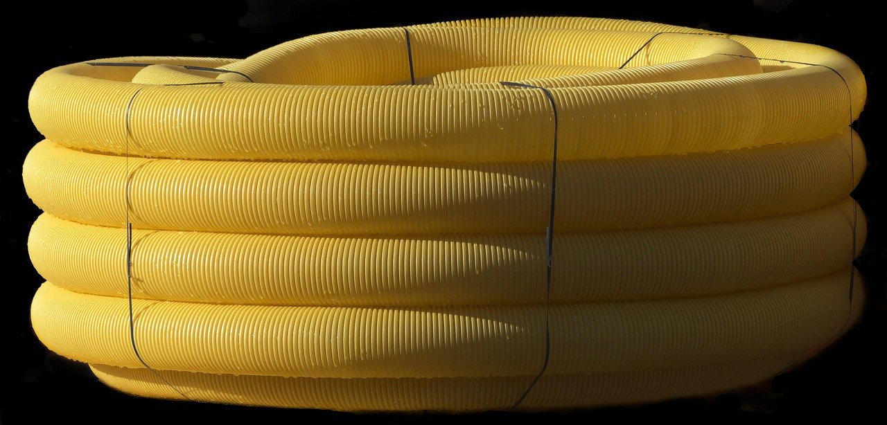 drain pipe, flexible, wound up, role, pvc, drainage pipe, drainage, tube, wrapped, plastic, yellow, construction site, pvc, pvc, pvc, pvc, pvc, drainage, drainage, drainage