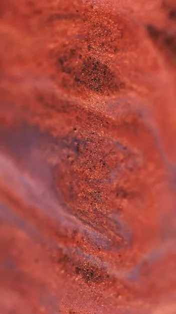Gel clouds glitter draw flow shiny fluid defocused red color gleaming sequin particles flicker in