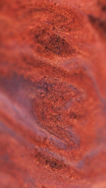 Gel clouds glitter draw flow shiny fluid defocused red color gleaming sequin particles flicker in