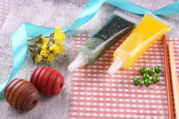 Scrapbooking craft materials on bright background