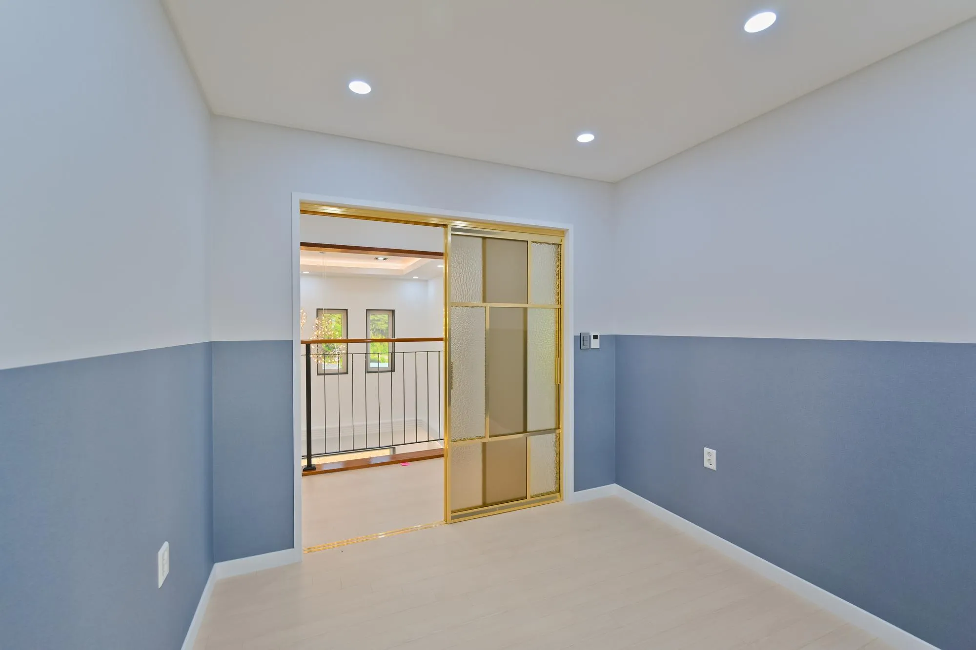 Sliding or folding doors look classic with a gold frame
