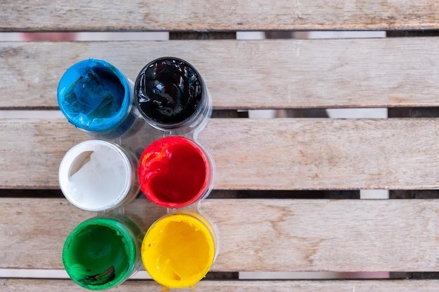 Table with some different painting colors on it