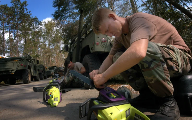 Gulfport, Miss. (Sept. 15, 2005) - U.S. Navy Builder 3rd Class Christopher Grisham, foreground, and Builder 3rd Class John Zolovick, both assigned to Naval Mobile Construction Battalion One (NMCB-1), perform maintenance on chainsaws as they remove fallen trees at Flint Creek Water Park in Gulfport, Miss. The park is being cleared to allow the Federal Emergency Management Agency (FEMA) to place trailers in the park’s campground for use as temporary housing for families displaced by Hurricane Katrina. The Navy's involvement in the Hurricane Katrina humanitarian assistance operations is led by the Federal Emergency Management Agency, in conjunction with the Department of Defense. U.S. Navy photo by Journalist 1st Class Dennis J. Herring (RELEASED)