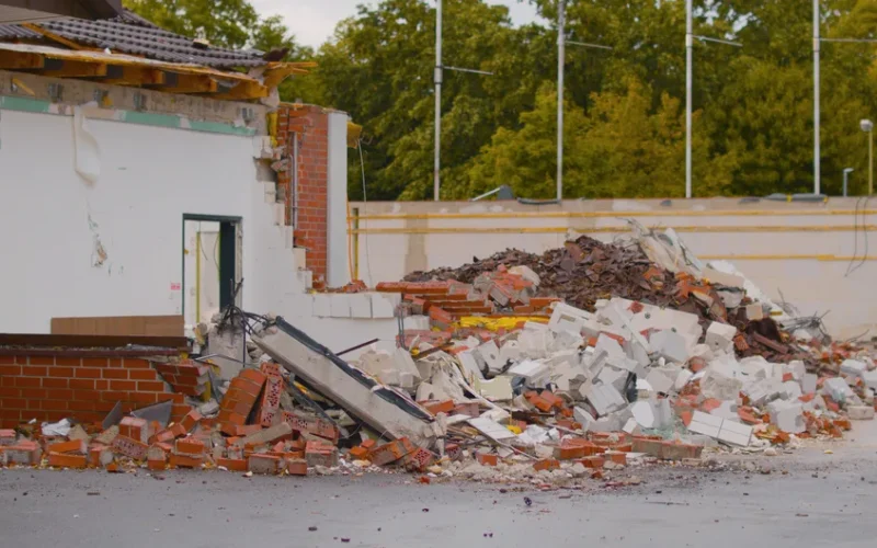 Demolished building site with debris in Essen, Germany. Ideal for urban decay concepts.